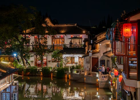 Explore the illuminated beauty of traditional architecture along Shantang Canal in Suzhou at night.